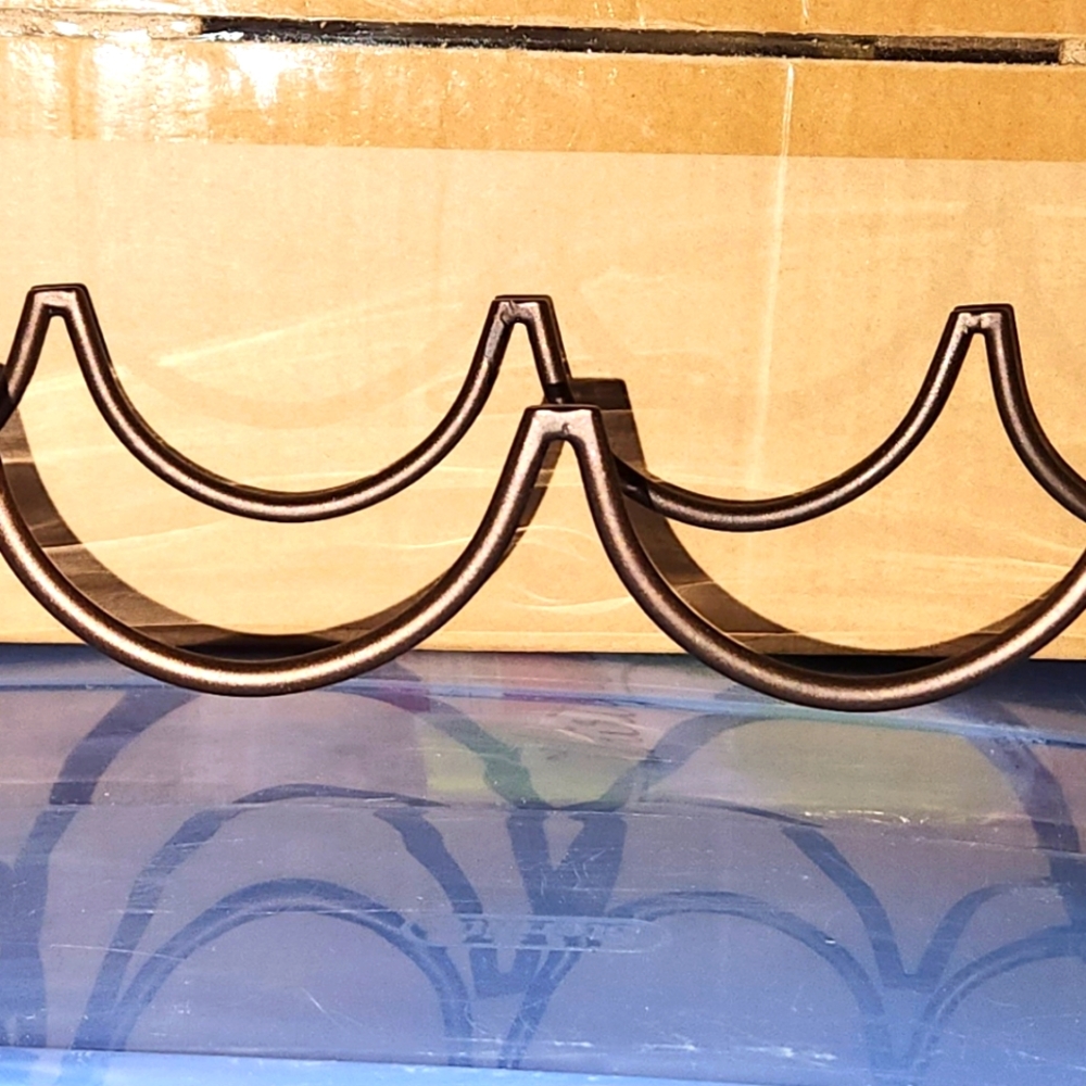 2 Bronze colored bottle racks - Holds 8 bottles